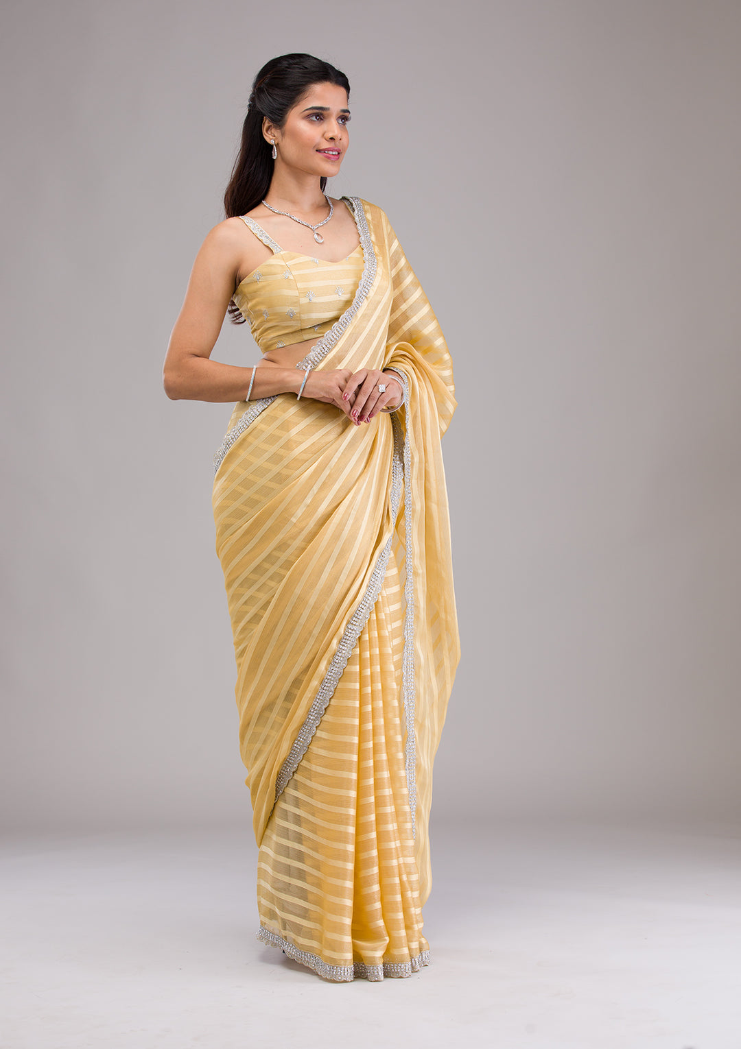 Yellow Stonework Semi Crepe Saree