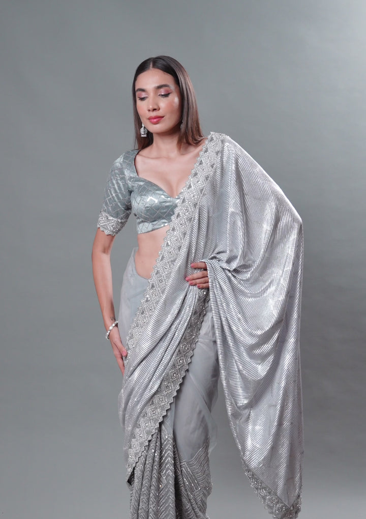 Light Grey Net Sequins Saree With Matching Blouse Piece