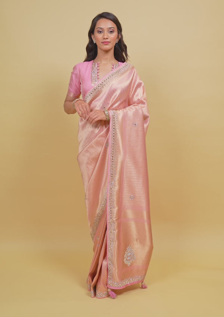 Koskii Orange Saree with Exquisite Threadwork – Traditional Elegance