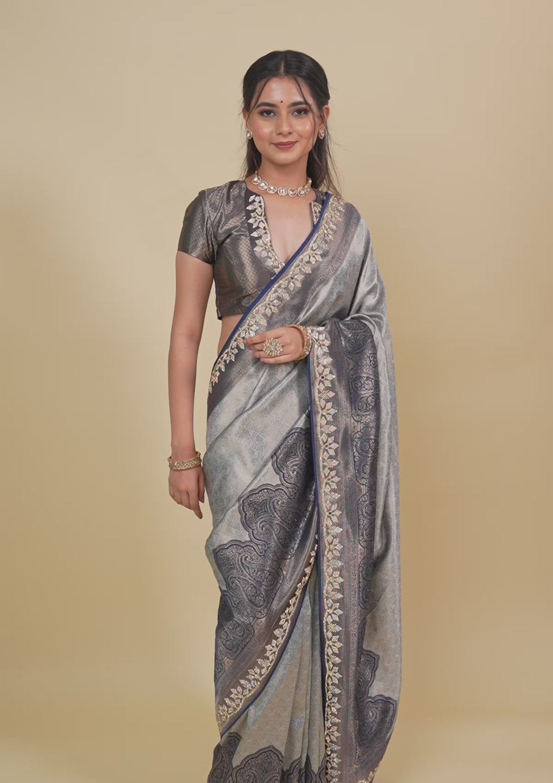 Koskii Orange Saree with Exquisite Threadwork – Traditional Elegance
